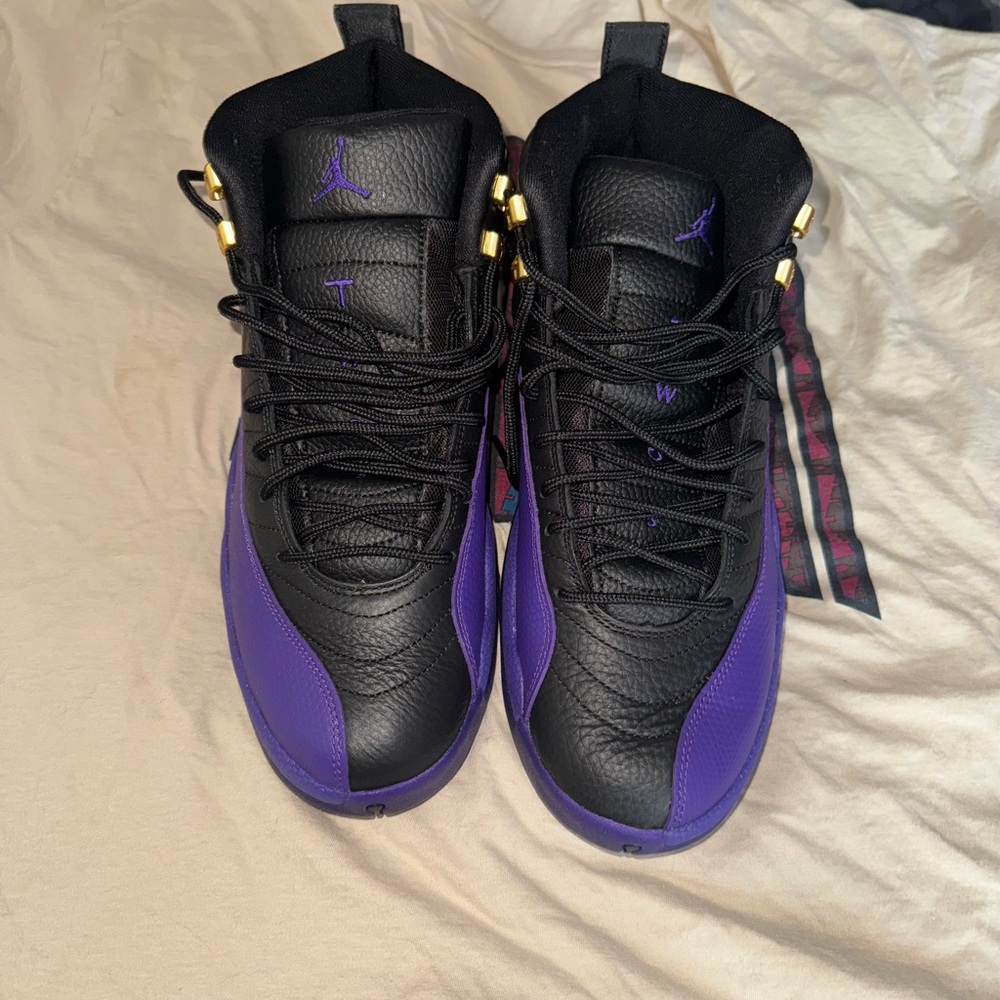 Jordan 12.  Sneakers with Black and Purple Accents